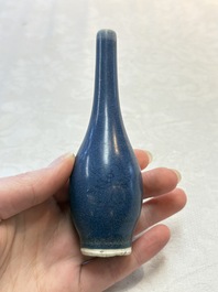 A pair of Chinese blue-glazed 'Hatcher Cargo' bottle vases with incised dragons, Transitional period