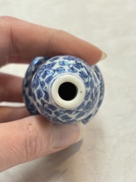 A Chinese blue and white double-gourd snuff bottle and a huali snuff bottle, Xuande and Qianlong mark, 18th C.