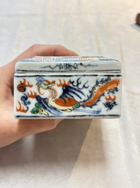 A Chinese wucai covered box, a blue and white ewer, a famille rose covered box and a plate, Wanli, Kangxi and Guangxu mark, 19/20th C.