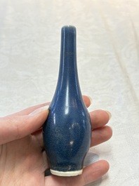 A pair of Chinese blue-glazed 'Hatcher Cargo' bottle vases with incised dragons, Transitional period