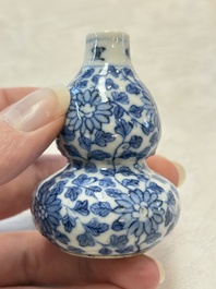 A Chinese blue and white double-gourd snuff bottle and a huali snuff bottle, Xuande and Qianlong mark, 18th C.