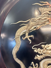 A large Japanese mother-of-pearl and bone-inlaid lacquer 'dragon' dish, Meiji, 19th C.