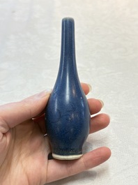 A pair of Chinese blue-glazed 'Hatcher Cargo' bottle vases with incised dragons, Transitional period