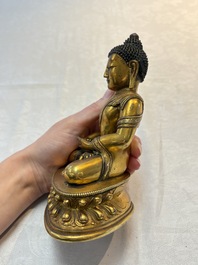 A fine Sino-Tibetan gilt-bronze figure of Buddha Shakyamuni, 17th C.