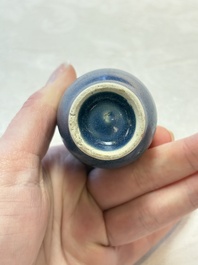 A pair of Chinese blue-glazed 'Hatcher Cargo' bottle vases with incised dragons, Transitional period