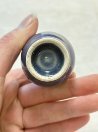 A pair of Chinese blue-glazed 'Hatcher Cargo' bottle vases with incised dragons, Transitional period