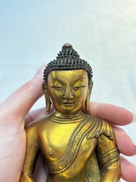 A fine Sino-Tibetan gilt-bronze figure of Buddha Shakyamuni, 17th C.