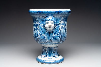 A large blue and white Dutch Delft garden vase with a putti fountain and Venus courting Adonis, 18th C.