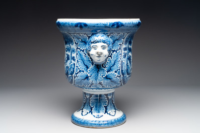 A large blue and white Dutch Delft garden vase with a putti fountain and Venus courting Adonis, 18th C.