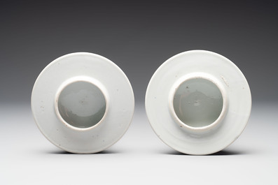 A pair of Chinese blue and white covered vases with floral design, 19th C.