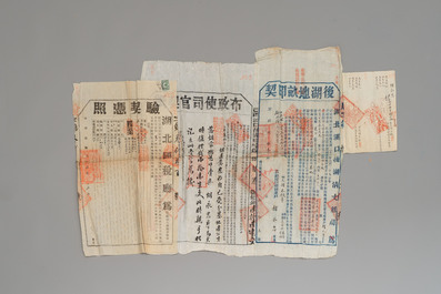 A large collection of 14 Chinese title deeds, 11 share applications, and a land law manual, 19/20th C.