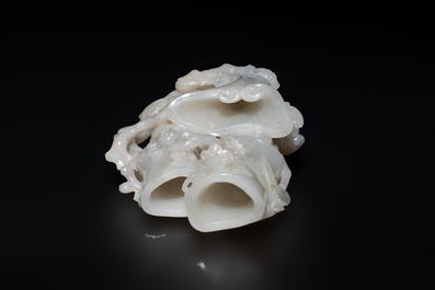 An extremely fine Chinese jade 'Three Friends of Winter' brush holder, Qianlong mark and of the period