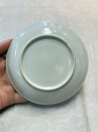 A pair of Chinese grisaille and iron-red 'landscape' cups and saucers, Yongzheng/Qianlong