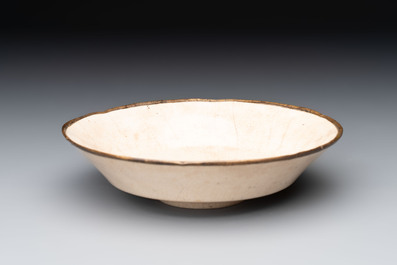 A Chinese ding-type lobed dish with a bronze mount, Song