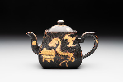 A Chinese gilt and black-lacquered Yixing teapot and cover, Qianlong mark and of the period