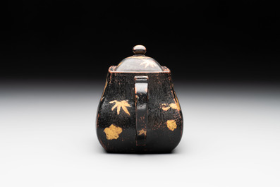 A Chinese gilt and black-lacquered Yixing teapot and cover, Qianlong mark and of the period