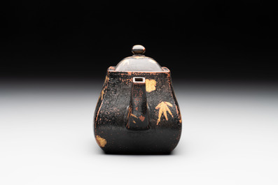 A Chinese gilt and black-lacquered Yixing teapot and cover, Qianlong mark and of the period