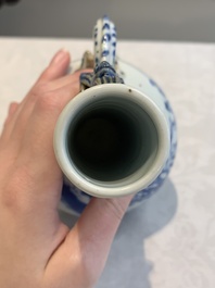 A pair of Chinese blue and white wine jugs with a chilong-form handle, possibly for the Vietnamese market, 19th C.