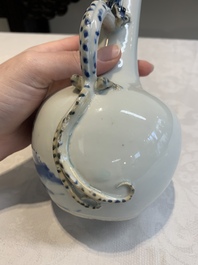 A pair of Chinese blue and white wine jugs with a chilong-form handle, possibly for the Vietnamese market, 19th C.