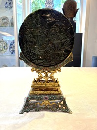 A fine Chinese spinach-green jade table screen with a gilt-cloisonn&eacute; stand, Qianlong