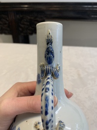 A pair of Chinese blue and white wine jugs with a chilong-form handle, possibly for the Vietnamese market, 19th C.