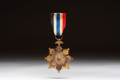 A Chinese 'Order of Extreme Bravery' medal (Order of the Golden Lion), inscribed Chi Dan 赤膽, Republic