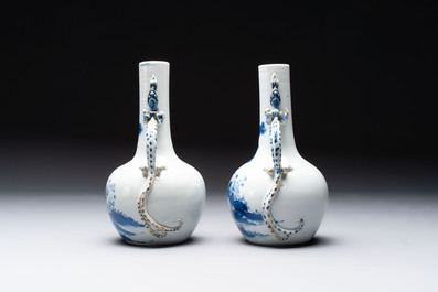 A pair of Chinese blue and white wine jugs with a chilong-form handle, possibly for the Vietnamese market, 19th C.