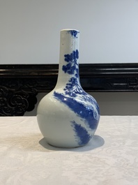 A pair of Chinese blue and white wine jugs with a chilong-form handle, possibly for the Vietnamese market, 19th C.