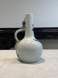 A pair of Chinese blue and white wine jugs with a chilong-form handle, possibly for the Vietnamese market, 19th C.