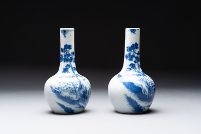 A pair of Chinese blue and white wine jugs with a chilong-form handle, possibly for the Vietnamese market, 19th C.
