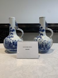 A pair of Chinese blue and white wine jugs with a chilong-form handle, possibly for the Vietnamese market, 19th C.