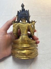 A Sino-Tibetan coral and turquoise-inlaid gilt-bronze Buddha Amitayus, 18th C.