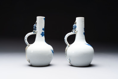 A pair of Chinese blue and white wine jugs with a chilong-form handle, possibly for the Vietnamese market, 19th C.