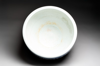 A massive Chinese blue and white 'lotus scroll' fish bowl, Qianlong/Jiaqing