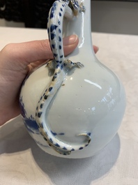 A pair of Chinese blue and white wine jugs with a chilong-form handle, possibly for the Vietnamese market, 19th C.