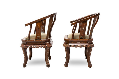 A pair of Chinese bone-inlaid hongmu chairs with dragons and phoenixes design, 20th C.
