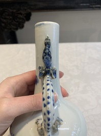 A pair of Chinese blue and white wine jugs with a chilong-form handle, possibly for the Vietnamese market, 19th C.