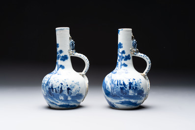 A pair of Chinese blue and white wine jugs with a chilong-form handle, possibly for the Vietnamese market, 19th C.