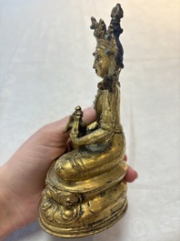 A Sino-Tibetan coral and turquoise-inlaid gilt-bronze Buddha Amitayus, 18th C.