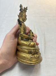 A Sino-Tibetan coral and turquoise-inlaid gilt-bronze Buddha Amitayus, 18th C.