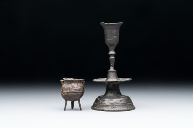 A miniature pewter candlestick and grape, excavated in Rotterdam, 16/17th C. or earlier
