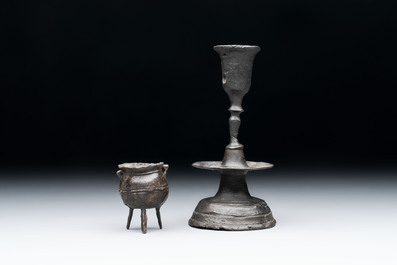 A miniature pewter candlestick and grape, excavated in Rotterdam, 16/17th C. or earlier