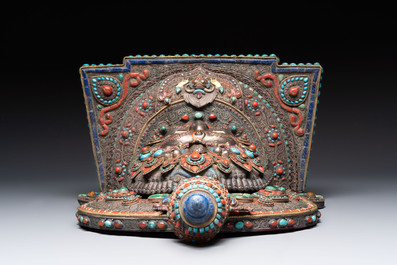 A fine large Nepalese red coral and precious stone-inset brass and silver filigree 'Bhairava' mask, 19th C.
