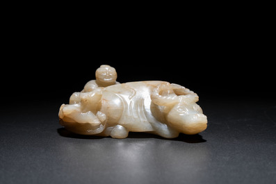 A Chinese jade 'boy on a buffalo' group, Qing