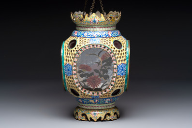 A very rare pair of Chinese Canton enamel lanterns with reverse painted glass panels, Qianlong