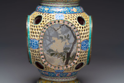 A very rare pair of Chinese Canton enamel lanterns with reverse painted glass panels, Qianlong