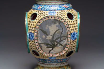 A very rare pair of Chinese Canton enamel lanterns with reverse painted glass panels, Qianlong