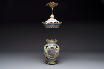 A very rare pair of Chinese Canton enamel lanterns with reverse painted glass panels, Qianlong