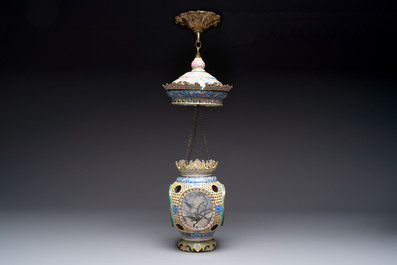 A very rare pair of Chinese Canton enamel lanterns with reverse painted glass panels, Qianlong