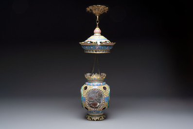 A very rare pair of Chinese Canton enamel lanterns with reverse painted glass panels, Qianlong